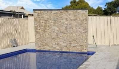 Pool water feature service tile